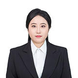 Yingying Guo in suit jacket looking at camera