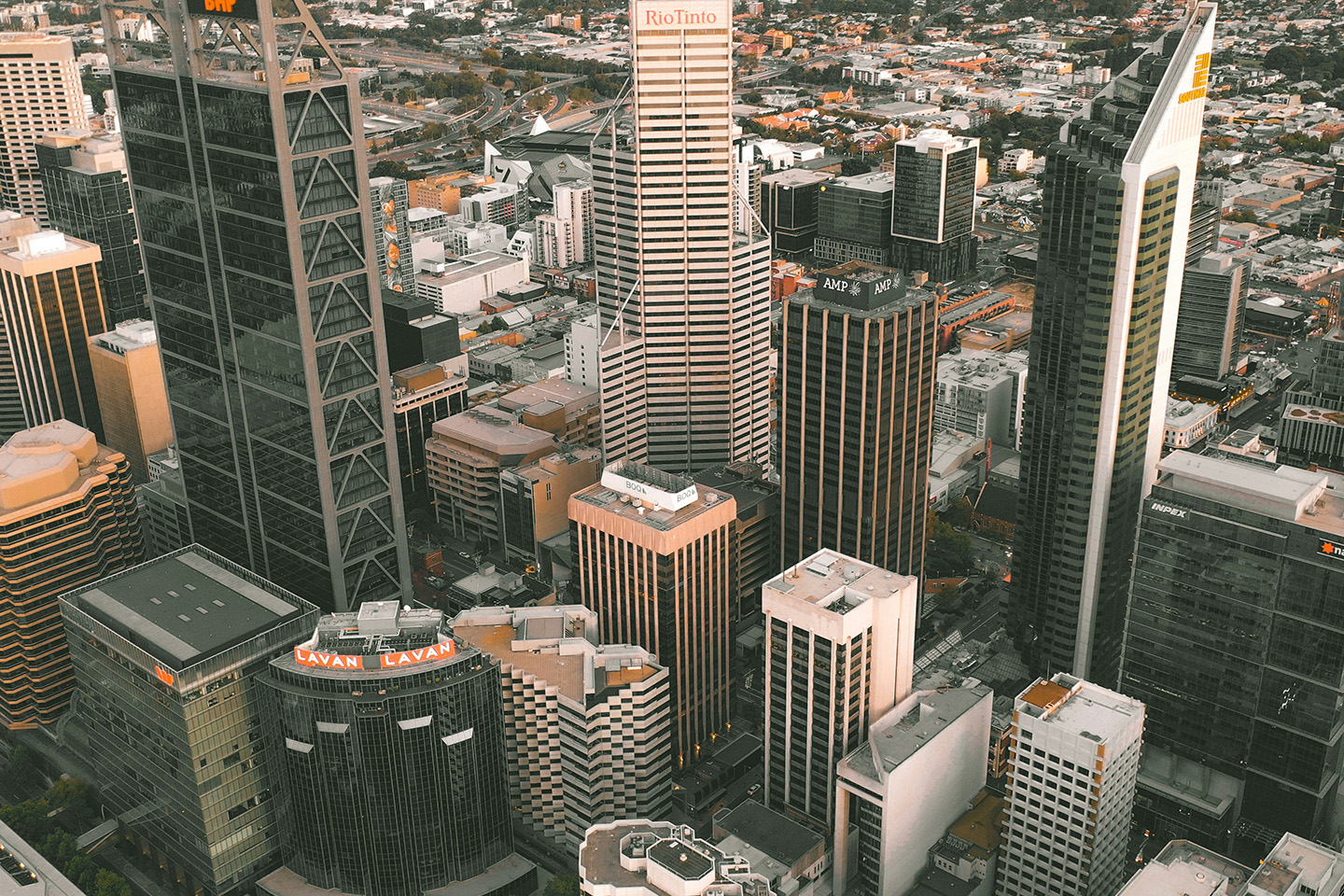 a block of high rise buildings pictured from above 