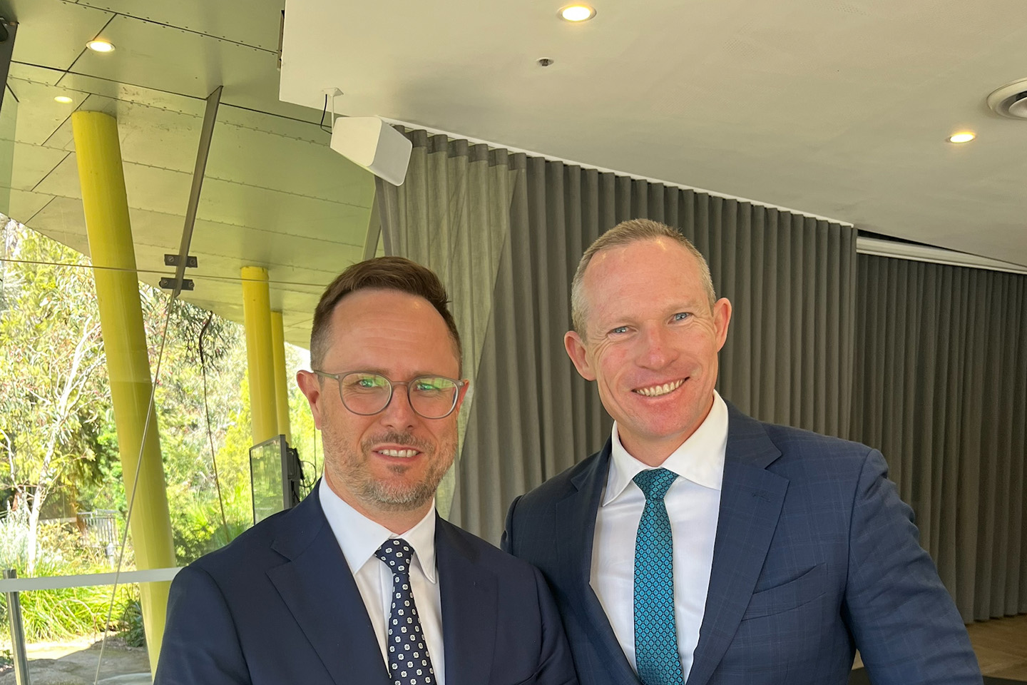 Damian Ogden with Minister De Brenni