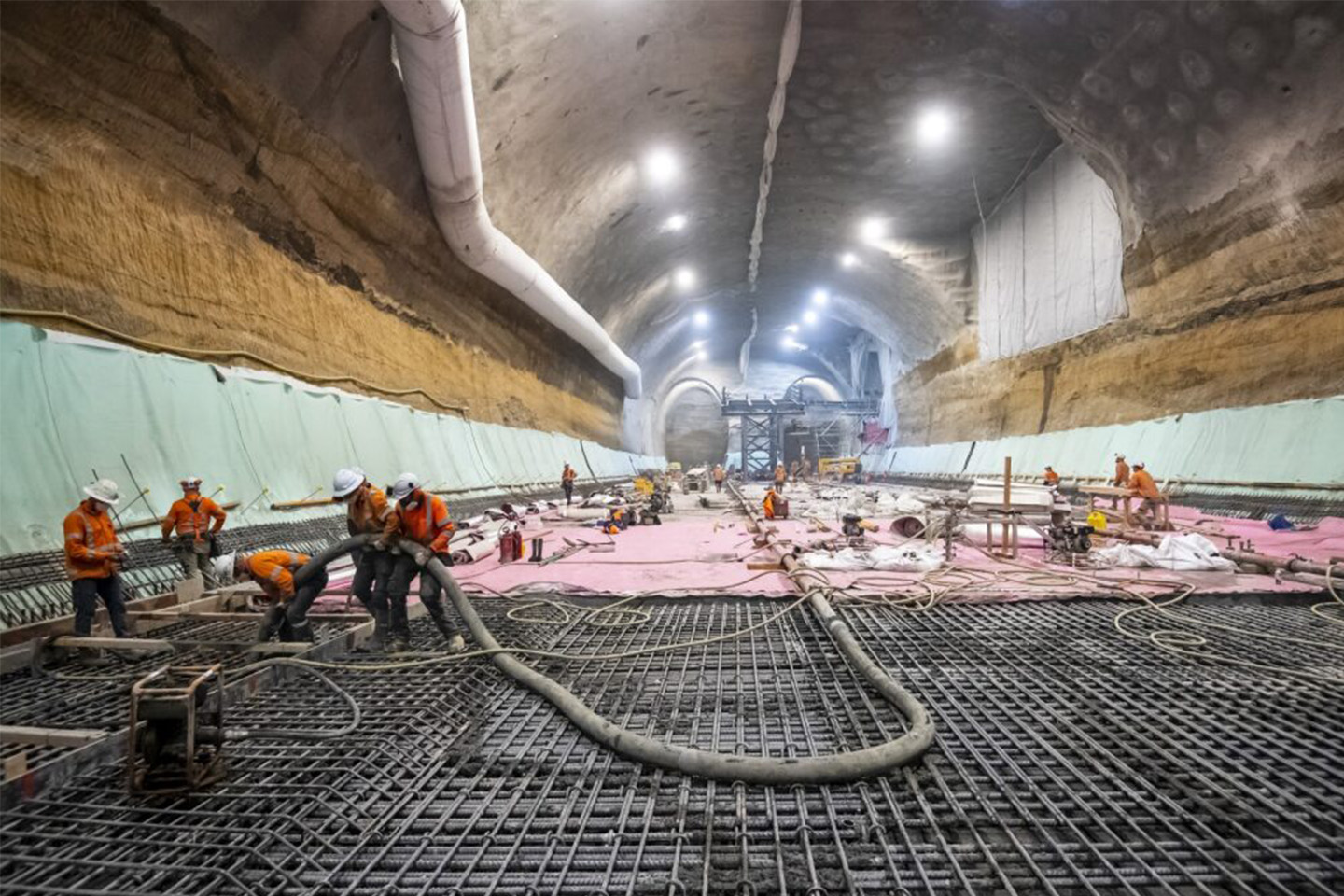 Image of underground tunnel, construction workers